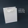 Vertical white matte paper gift bag with satin handles, size 11x6x13cm for jewelry - White Handbag (11x6x13cm)