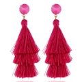 Fashionable long three-tier fuchsia tassel earrings with gold-tone resin top on white background - Rose Red