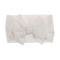 Close-up view of a soft white infant headband featuring a large textured fabric bow detail - Pre-tied Bow / White