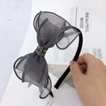 Detail of grey mesh bow headband with rhinestone center and elegant fabric wrap - Mesh Grey