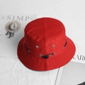 Detail of red canvas bucket hat with metal eyelets and decorative sport drawstring - Red