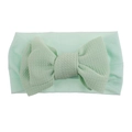 Detail der mintgrünen Waffelstruktur auf dem weichen, elastischen Nylon-Babystirnband - Minzgrün