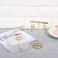 Golden T-bar metal earring stand set on a marble base for jewelry display - T-Shape Flat Bar With Holes: 2-Piece Set