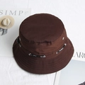 Detail of dark brown cotton bucket hat with metal eyelets and sporty lettered drawstrings - Coffee