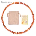 Collana di ambra per neonati con perline color miele, sacchetto di lino e certificato - Ambra di Fuoco