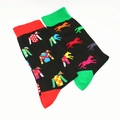 Detail of cotton crew socks featuring colorful horse racing jacquard patterns and ribbed cuffs - Horse Racing