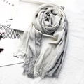 Grey and white gradient linen scarf with pleated texture and delicate fringe trim - Light Grey