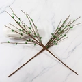 Two artificial berry branches with green pearl buds on white marble for DIY Xmas decor - Green