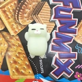 Cute mint green cat mochi squishy toy with sleeping face for stress relief - Green Cat