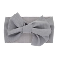 Elastic baby headband in grey waffle knit fabric with a large sweet bow accent - Gray