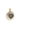 Macro shot of baroque pearl button pendant with turquoise heart inlay and gold loop - No.2 Heart Turquoise Mother of Pearl