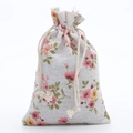 Floral drawstring jewelry pouch made of off-white cotton linen with pink flower prints - Little Floral