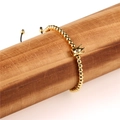 Verstellbares schwarzes Kordelarmband mit Goldperlen und einem Kronenanhänger - Kronenauge