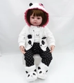 Realistic reborn baby doll wearing a black and white panda themed outfit and plush boots - Brown Panda