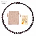 Deep cognac Baltic amber baby necklace with linen pouch and certificate of authenticity - Dark Red Amber