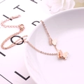 Collana in acciaio al titanio oro rosa con eleganti ciondoli a farfalla opachi e lucidi - Oro rosa