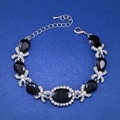 Silbernes Brautarmband mit schwarzen Kristallen und weißen Strasssteinen und Verlängerung - Schwarz