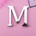 Self-adhesive 3D silver acrylic mirror wall sticker in capital letter M shape - M