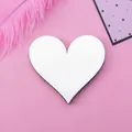 Silver mirror acrylic heart wall sticker with a high reflective finish on pink background - Heart