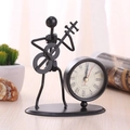 Creative vintage iron musician desk clock featuring a guitarist figure for home decor - C70 Bass Clock