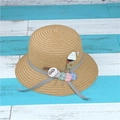 Kids straw sun hat in light brown featuring a cute handmade caterpillar decoration - Single Hat / Khaki