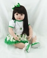 Realistic reborn baby doll with long black hair wearing a green clover themed dress - Purple Clover