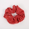 Dettaglio di un elastico in chiffon rosso a pois bianchi con trama in tessuto - Pois / Rosso