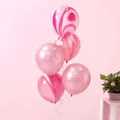 Detailed view of five marble-patterned latex balloons with elegant pink and white swirls - 10" / Red Agate Pattern