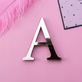 Silver mirror acrylic letter A wall sticker with glossy finish on pink background - Letter A