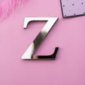 Silver mirror acrylic letter Z wall sticker with reflective surface on pink background - Letter Z