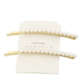Set of two gold-plated hair pins with elegant white pearls on a white background - H184-3 (Single Row Pearl)