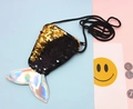 Detail of mermaid tail coin purse with reversible black and gold sequins and laser tail - Black + Gold