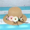 Straw sun hat with pink daisy flowers and brown bow detail on striped background - M (56-58cm) / Khaki