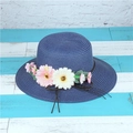 Navy blue straw sun hat for women with pink daisy flowers and bow for beach outings - M (56-58cm) / Navy Blue