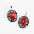 Bohemian vintage leverback earrings featuring red stone in ornate silver metal frame - Hollow Oval Red Turquoise