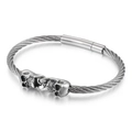 Brazalete gótico de cable de acero plateado con calaveras dobles y cierre imán - Calavera