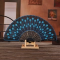 Black folding fan with blue sequin peacock embroidery and golden openwork lace details - Light Blue