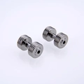 Macro shot of dark grey dumbbell beads with vintage striped metal texture for DIY jewelry - Gun Black