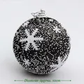 Pallina di Natale da 10cm con fiocchi di neve bianchi e schiuma su glitter nero - 10cm / Nero