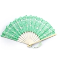 Detailed view of a green lace folding fan with intricate floral patterns and matching tassel - 27CM White Rib Green