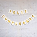 Detail of Feliz Cumpleaños banner with gold letters on white swallowtail cardstock flags - White Swallowtail Banner