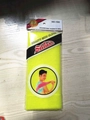 Bright yellow Salux exfoliating nylon bath towel in clear packaging for skin care - Yellow