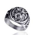 Detailed close-up of antique silver lion head carving on a stainless steel men's ring - Size 7 / Steel