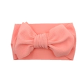 Pink coral waffle fabric baby headband with a soft textured bow accessory - Watermelon red