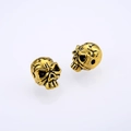 Vintage gold skull beads for DIY jewelry making featuring a punk style with horizontal holes - Antique Gold