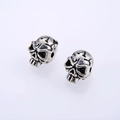 Pair of vintage silver skull charms with antique texture for DIY jewelry making - Antique Silver