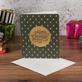 Dark green Merry Christmas card with gold foil trees on wooden table with white envelope - Dark Green Base English Text