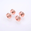 Macro detail of rose gold dumbbell spacer beads with concentric ridges for DIY jewelry - Rose Gold