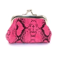 Close-up of pink snake skin texture on small vintage coin purse with silver metal clasp - Rose Red