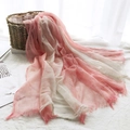 Pink and white gradient linen cotton scarf with frayed tassel edges in a soft drape - Pink + White